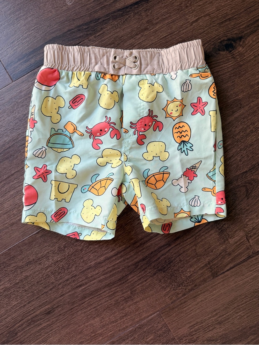 Adorable, fun, Mickey Mouse Swim Shorts - Mint with Coral & Yellow Sea Print